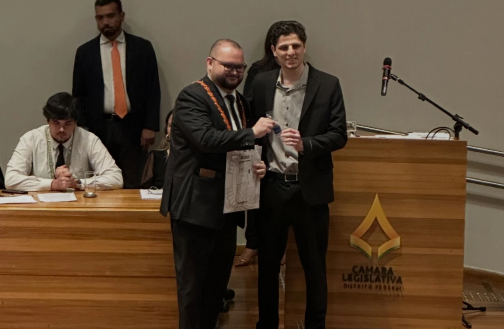 Apresentação sobre inteligência em saúde e participação em um evento de inovação